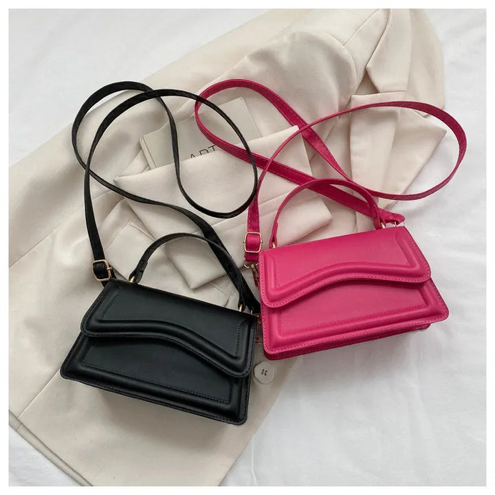 Melissa Femme Sac à bandoulière en similicuir | Sac crossbody compact à rabat ondulé