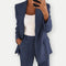 Completo premium da donna con blazer e pantaloni, ideale per la primavera/estate