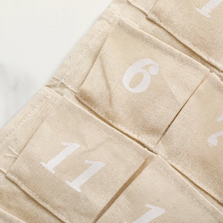Calendrier de l’Avent WinterCharm | 24 Poches en Coton Naturel Réutilisable