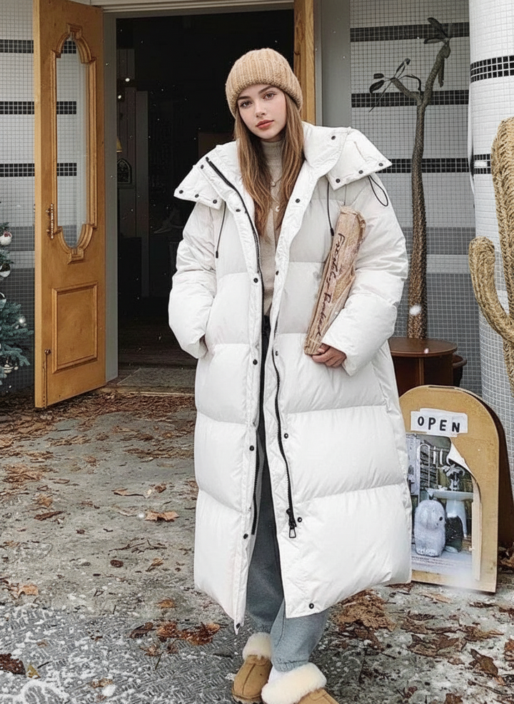 Veste longue matelassée femme | Coupe décontractée, capuche et protection coupe-vent