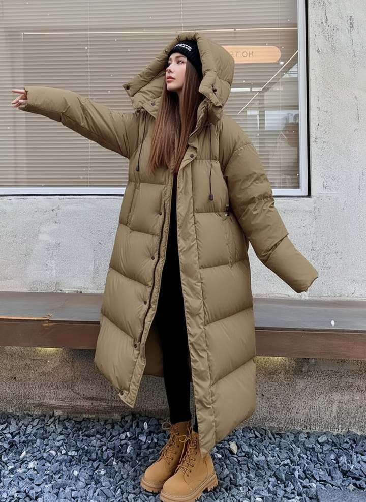 Veste longue matelassée femme | Coupe décontractée, capuche et protection coupe-vent