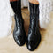 Botins de couro com atacadores para mulher