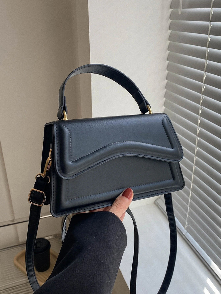 Melissa Femme Sac à bandoulière en similicuir | Sac crossbody compact à rabat ondulé