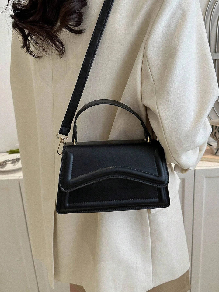 Melissa Femme Sac à bandoulière en similicuir | Sac crossbody compact à rabat ondulé