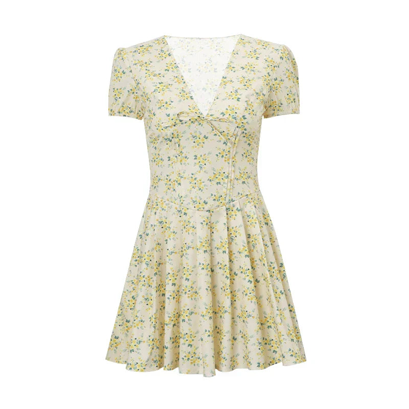 Romy Robe d'été pour femmes | Robe courte à fleurs avec manches bouffantes & décolleté dans le dos avec noeud