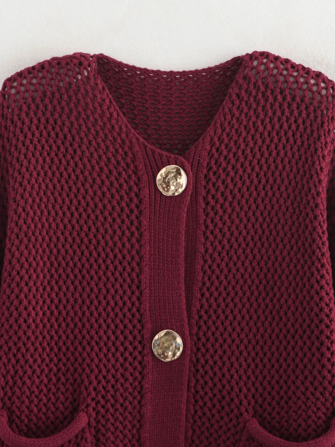 Estelle – Gilet chic en maille avec boutons traditionnels