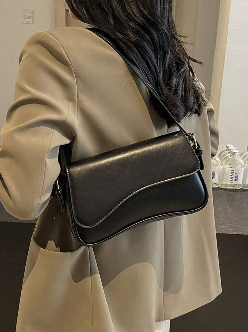Janita | Bolso de hombro para mujer con diseño fino y ondulado: versátil, lujoso y moderno.