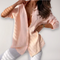 Camicia da donna con patta di bottoni e maniche risvoltate