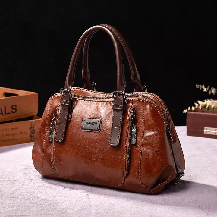 Elegante bolso de mano Nancy de piel sintética | Resistente a arañazos, impermeable y con estilo