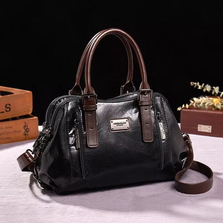 Elegante bolso de mano Nancy de piel sintética | Resistente a arañazos, impermeable y con estilo