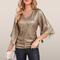 Blusa femenina dorada con lentejuelas elegante para noche