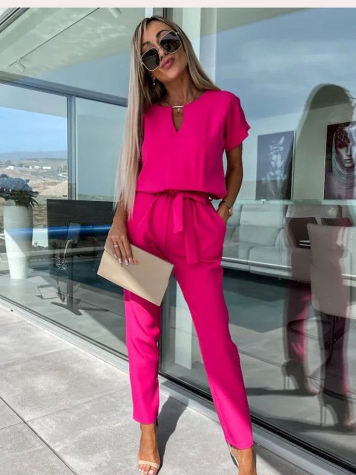 Elara Combinaison femme avec col en V | Une pièce élégante avec noeud & jambes larges