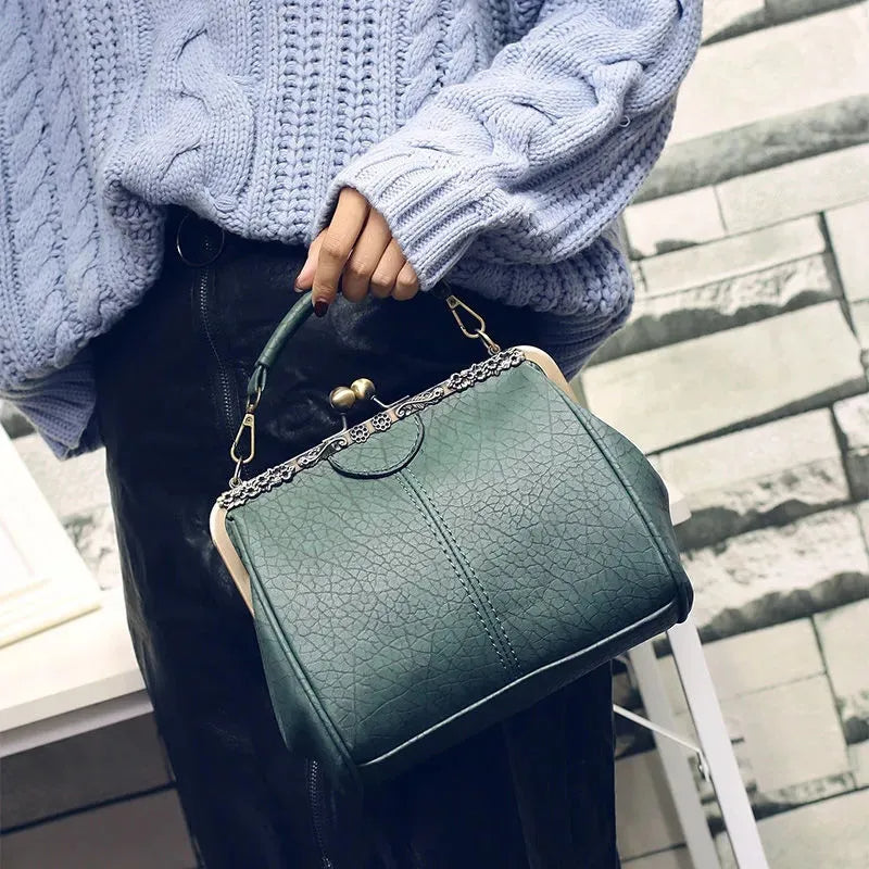 Coby | Borsa da donna classica con chiusura a clip - Senza tempo, elegante e lussuosa