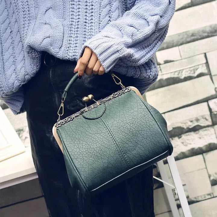Coby | Borsa da donna classica con chiusura a clip - Senza tempo, elegante e lussuosa