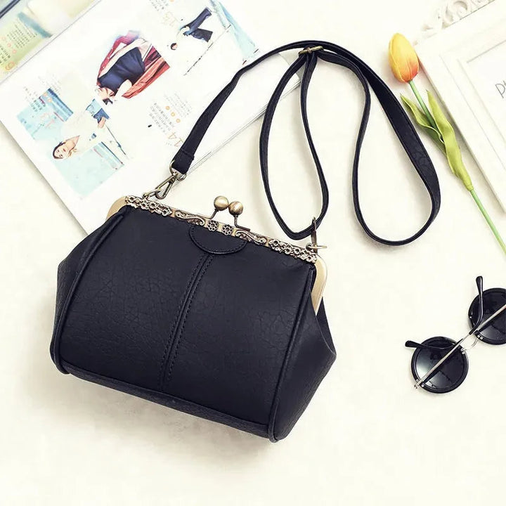 Coby | Borsa da donna classica con chiusura a clip - Senza tempo, elegante e lussuosa