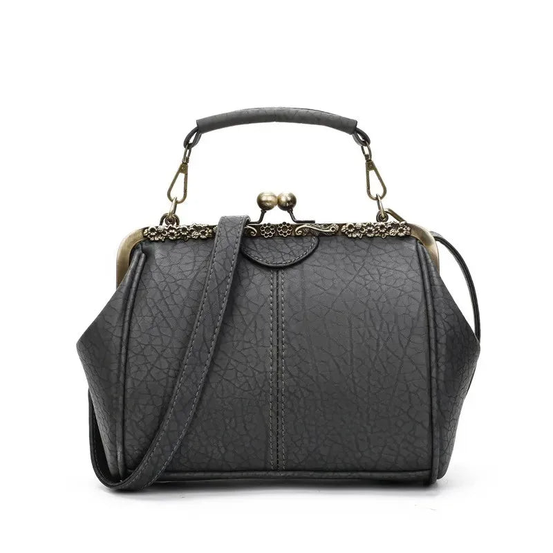 Coby | Borsa da donna classica con chiusura a clip - Senza tempo, elegante e lussuosa