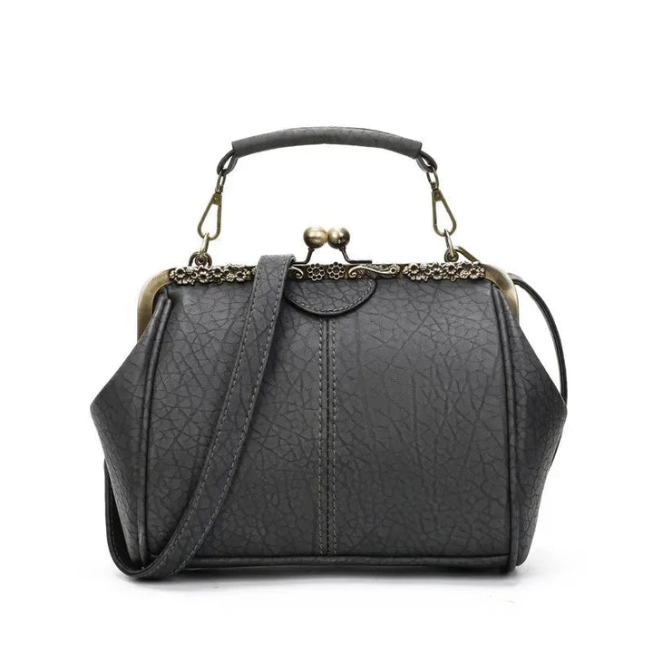 Coby | Borsa da donna classica con chiusura a clip - Senza tempo, elegante e lussuosa