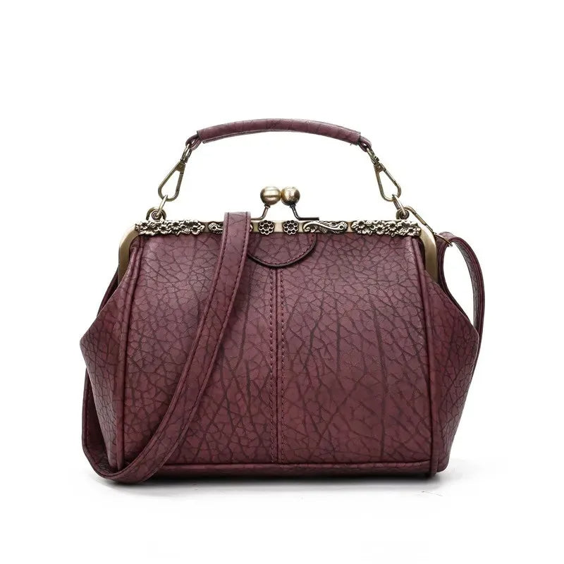 Coby | Borsa da donna classica con chiusura a clip - Senza tempo, elegante e lussuosa