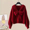 Maglione da donna in maglia con scollo a V e grande fiocco - Elegante modello con maniche a pipistrello