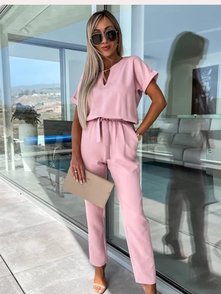 Elara Combinaison femme avec col en V | Une pièce élégante avec noeud & jambes larges
