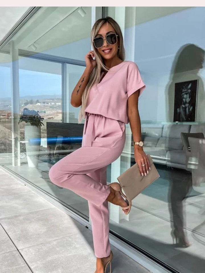 Elara Combinaison femme avec col en V | Une pièce élégante avec noeud & jambes larges