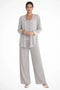 Completo da donna con paillettes composto da tre pezzi, giacca e pantaloni a gamba larga